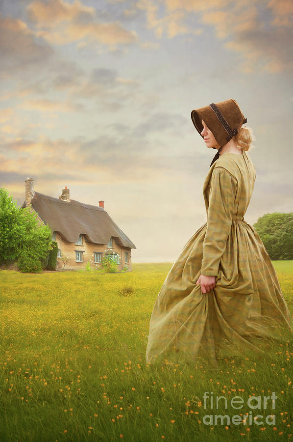 Young Victorian Woman In A Buttercup Meadow With Thatched Cottage Photograph by Lee Avison