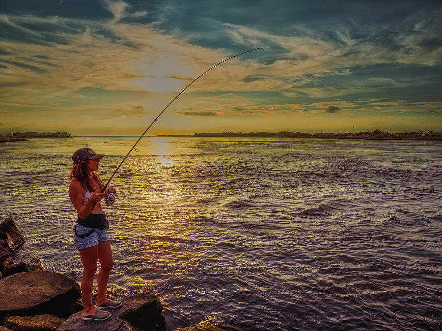 Young Woman Fishing Photograph by David Kay