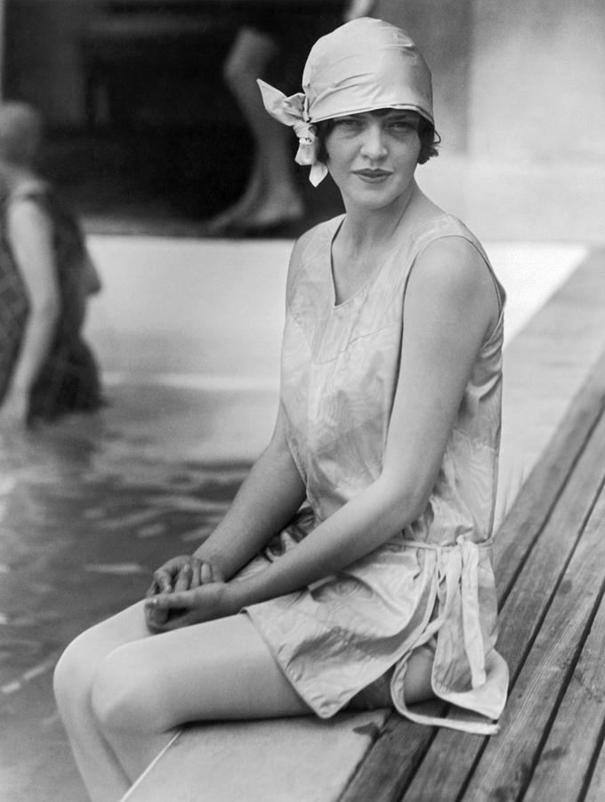 Vintage Photograph - Young Woman Sitting By Pool by Underwood Archives