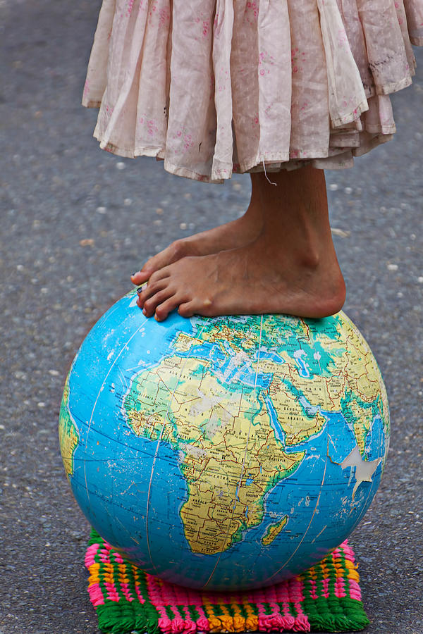 Planet Photograph - Young woman standing on globe by Garry Gay
