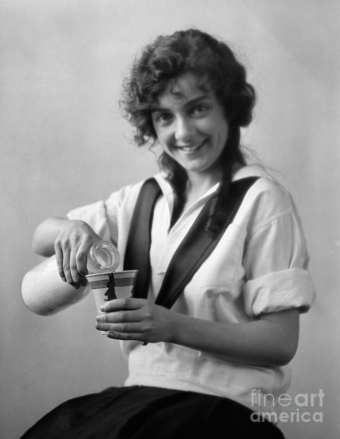 Young Woman With Milk, C.1920s Photograph by H. Armstrong Roberts/ClassicStock