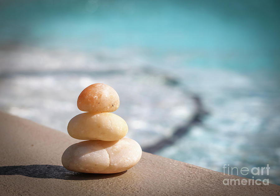 Zen stones by the pool Photograph by Claudia M Photography