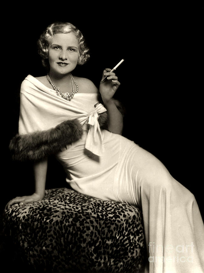 Ziegfeld Model Reclining In Evening Dress  Holding Cigarette By Alfred Cheney Johnston Photograph