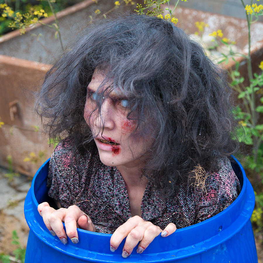 Zombie in barrel - scary and funny Photograph by Matthias Hauser