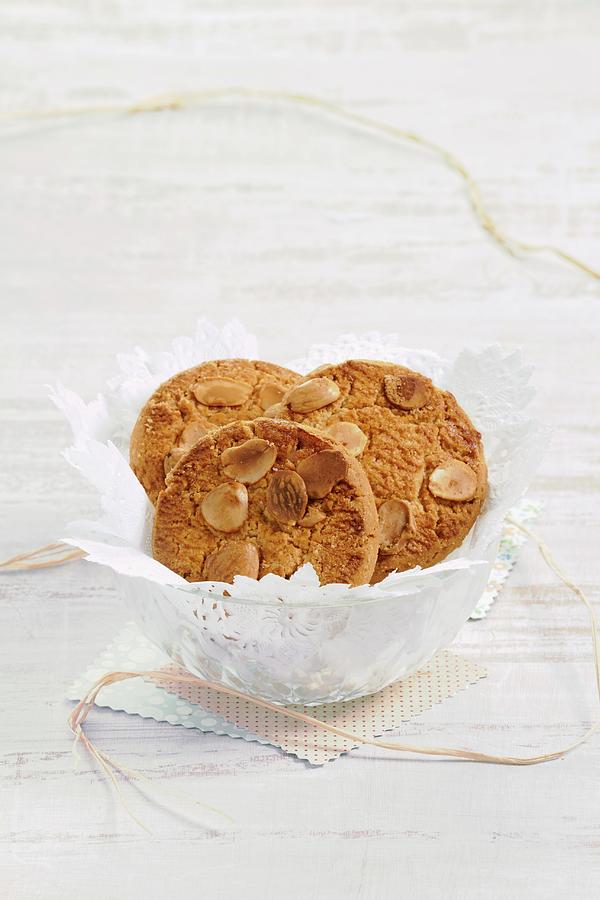 A Bowl Of Almond Biscuits #1 Photograph by Miriam Rapado