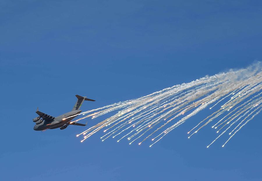 A C 17 Globemaster III releases flares Painting by Celestial Images ...