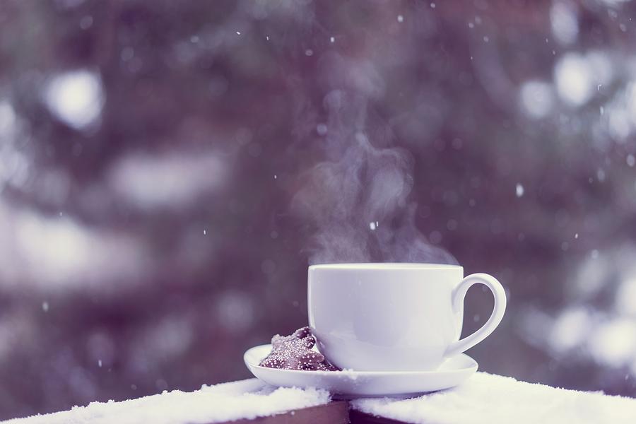 Tea Photograph - A Cup Of Hot Tea With Biscuits On A Saucer On A Snow-covered Balcony #1 by Alena Haurylik