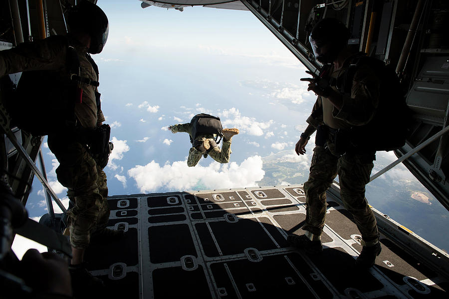 Guam Photograph - A Free Fall Jump From A C-130 Hercules 1 by Stocktrek Images Guam Photograph - A Free Fall Jump From A C-130 Hercules 1 by Stocktrek Images