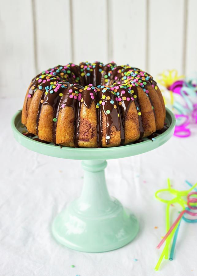 A Gugelhupf With A Chocolate Glaze And Sugar Confetti For A Carnival ...