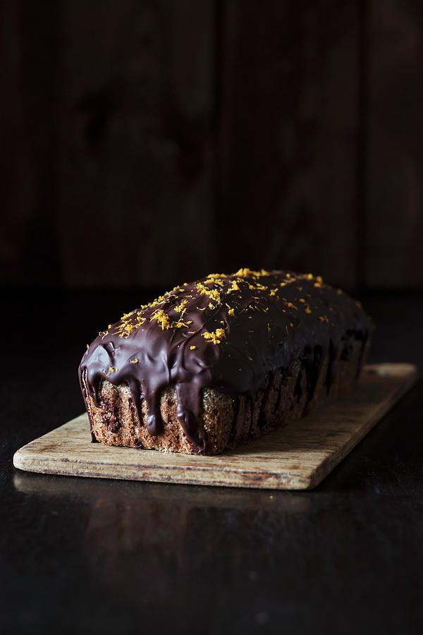 A Loaf Cake With Gingerbread Spice And Chocolate Glaze #1 Photograph by Malgorzata Laniak