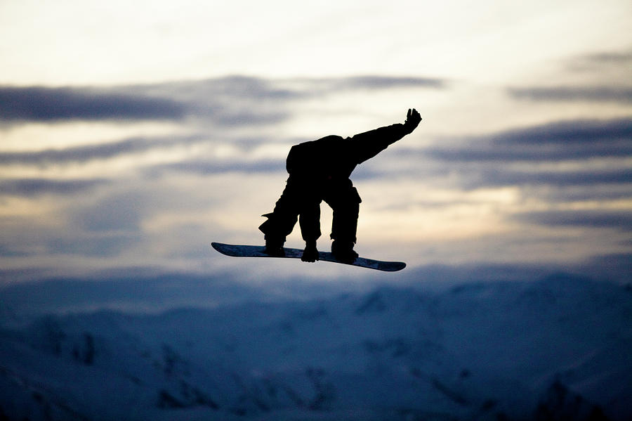 A Male Snowboarder Does A Backside 180 Photograph by Kyle Sparks A Male Snowboarder Does A Backside 180 Photograph by Kyle Sparks