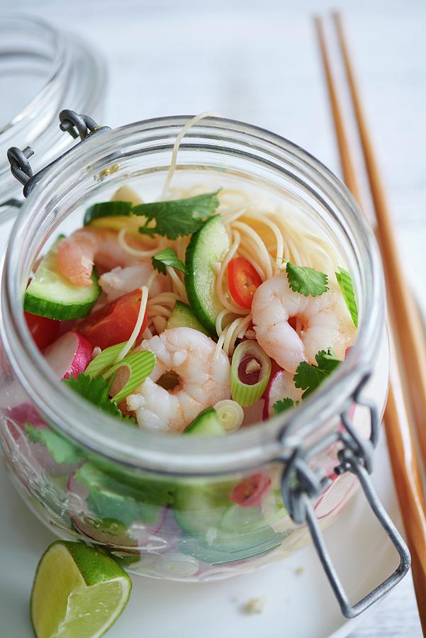 A Noodle Salad With Radishes And Shrimps In A Glass Jar #1 Photograph by Amanda Stockley