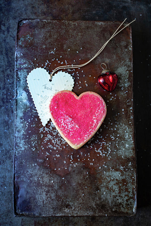 A Pink Heart-shaped Biscuits With A Pendant #1 Photograph by Eising Studio