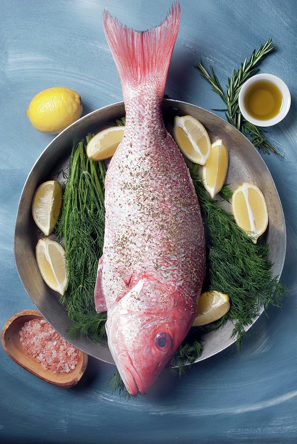 A Red Snapper Ready To Roast #1 Photograph by Spyros Bourboulis