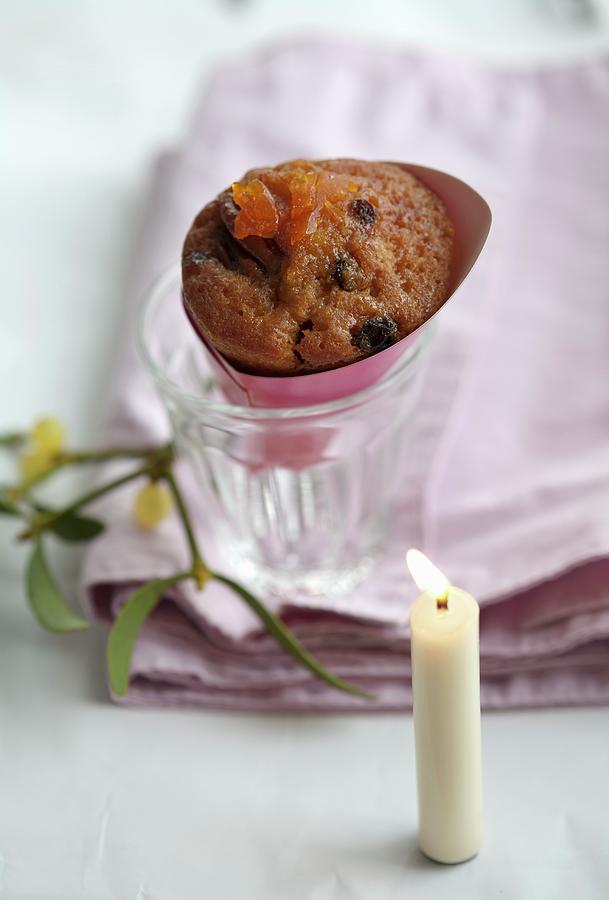 A Sponge Cake With Rum-soaked Raisins, Candied Oranges And Kumquats In A Bag #1 Photograph by Martina Schindler