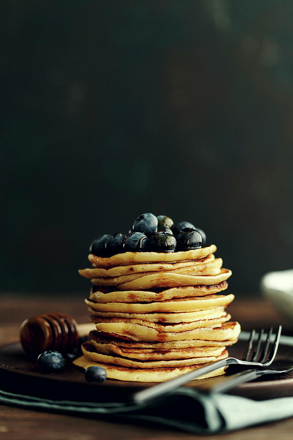 A Stack Of Pancakes With Blueberries And Maple Syrup #1 Photograph by Valeria Aksakova