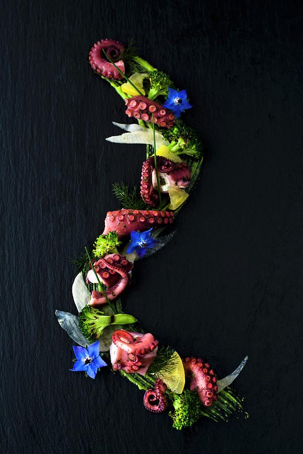 A Starter With Marinated Octopus, Lemon And Grilled Broccoli Florets On Salsa Verde With Borage Flowers #1 Photograph by Jamie Watson