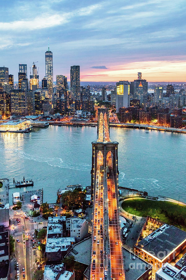 Aerial of New York city  and Brooklyn bridge at dusk #1 Photograph by Matteo Colombo