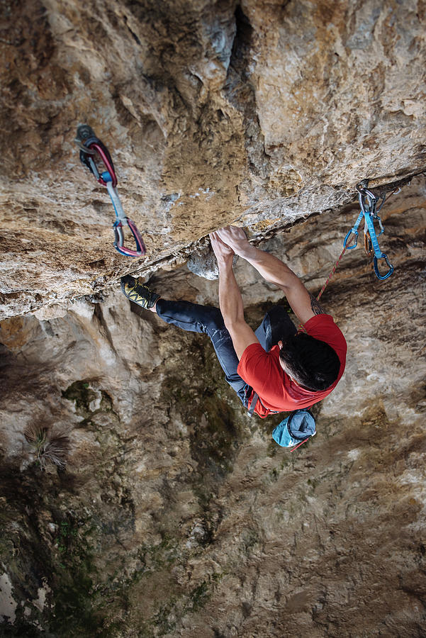 Aerial View Of A Climber On A Hard Sport Climbing Route In A Cave ...