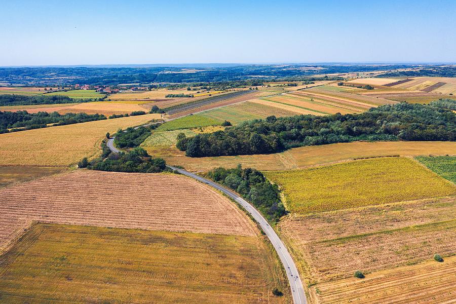 Transportation Photograph - Aerial View Of A Country Road Amid #1 by Daniel Chetroni