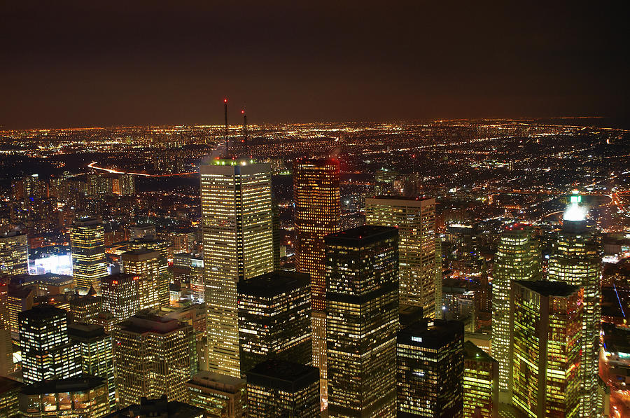 Aerial View Of Toronto Lit Up At Night #1 Photograph by Peter Muller