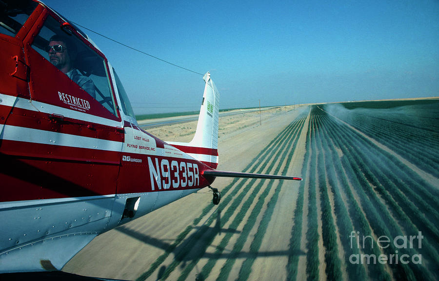 Agricultural Aircraft Spraying A Cotton Crop #1 Photograph by Peter Menzel/science Photo Library