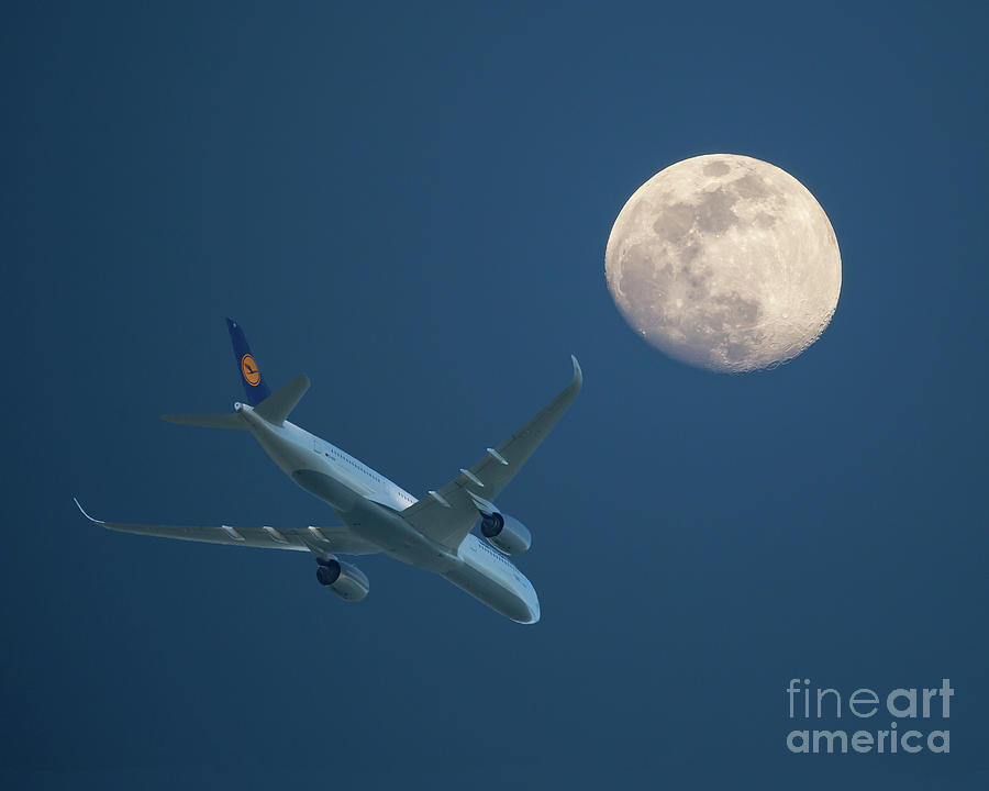 Airliner and Full Moon by Kevin McCarthy Airliner and Full Moon by Kevin McCarthy