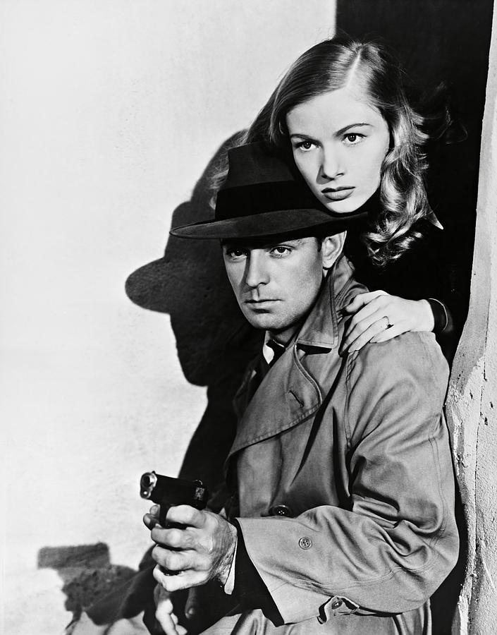 ALAN LADD and VERONICA LAKE in THIS GUN FOR HIRE -1942-. #1 Photograph by Album