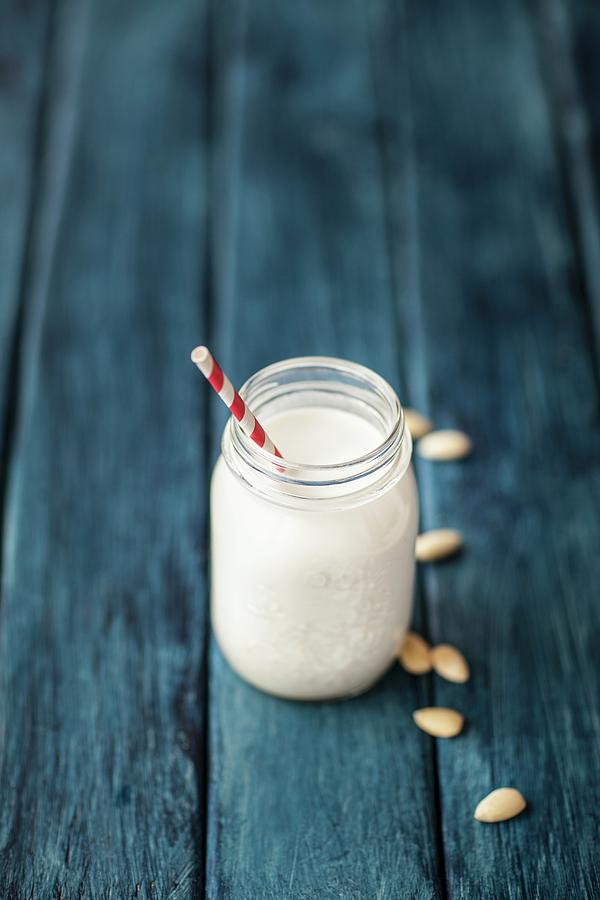 Almond Milk In Glasses With Straws #1 Photograph by Nika Moskalenko
