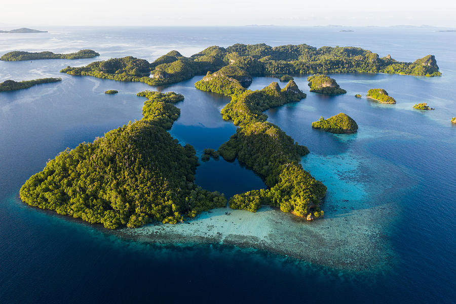 An Aerial View Of Islands In Raja Photograph by Ethan Daniels - Fine ...