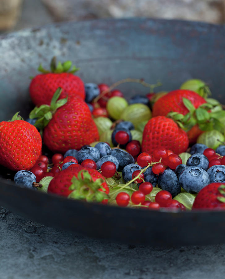 An Antique Collander Filled With Strawberries, Blueberries, Red Currants And Gooseberries #1 Photograph by Ryla Campbell
