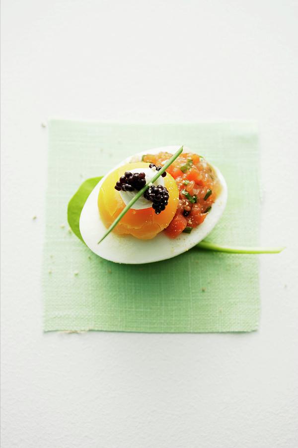 An Egg With Salmon Tartar, Crme Frache And Caviar #1 Photograph by Michael Wissing
