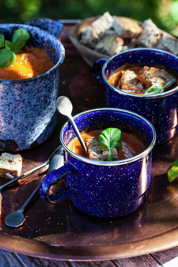 Summer Photograph - Antique Enamel Mugs With Tomato Soup Topped With Basil And Whole Wheat Croutons #1 by Ryla Campbell