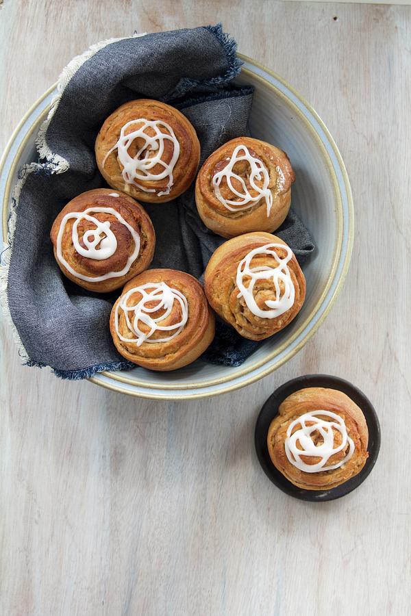 Apple And Cinnamon Buns With Icing #1 Photograph by Maru Aveledo