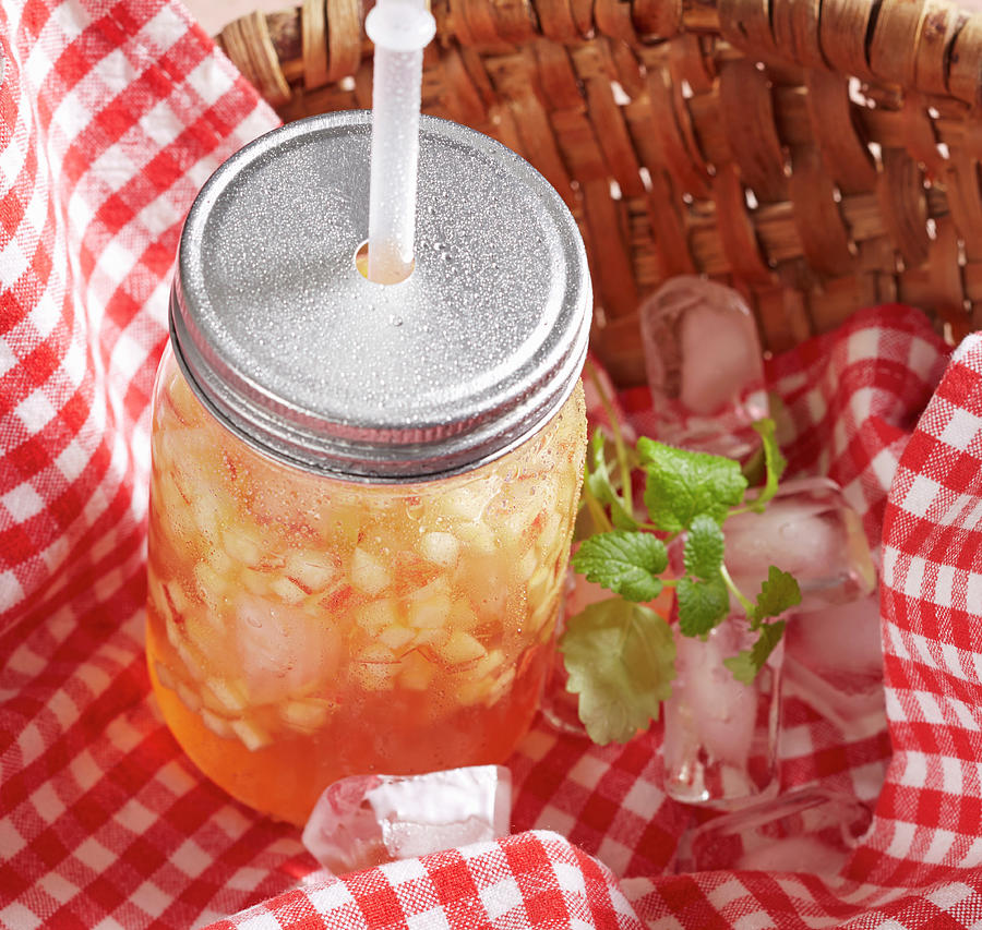 Apple And Vanilla Iced Tea In A Basket For A Picnic #1 Photograph by Teubner Foodfoto