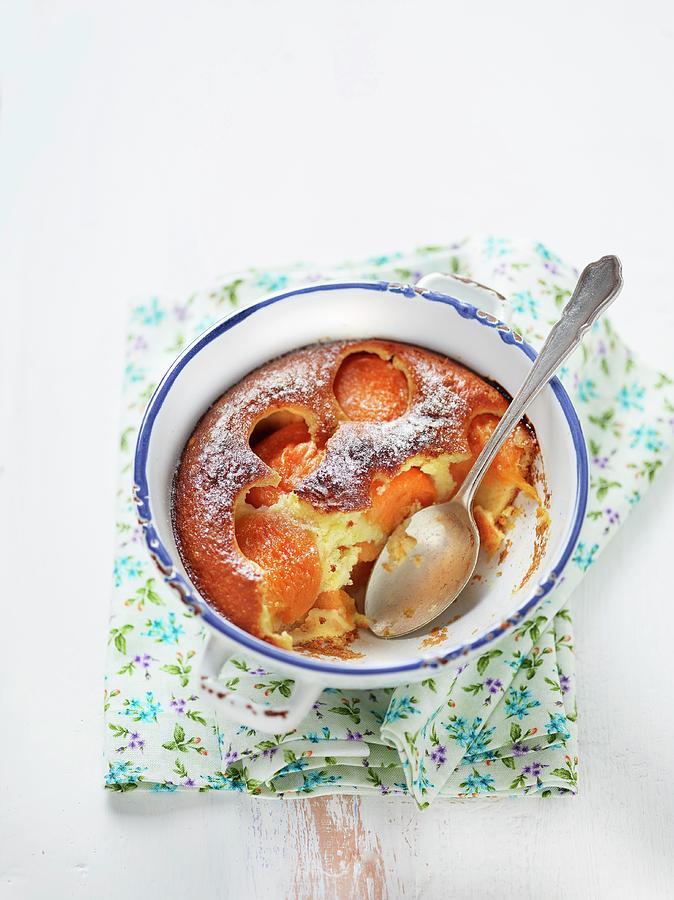 Apricot Cake Dusted With Icing Sugar In An Old Enamel Baking Tin #1 Photograph by Frdric Perrin