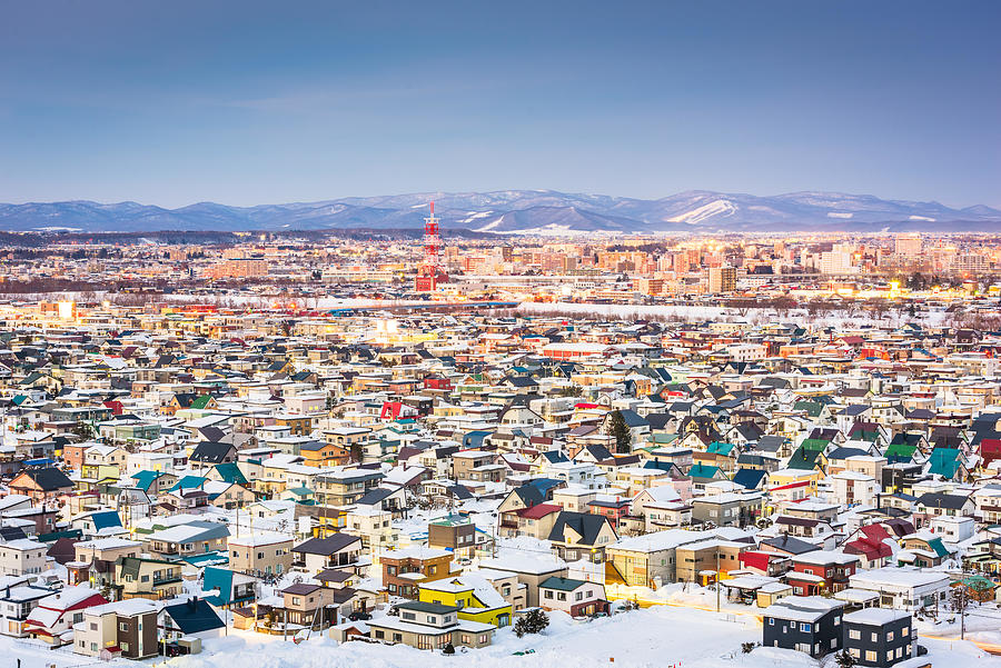 Mountain Photograph - Asahikawa, Japan Twilight Winter #1 by Sean Pavone
