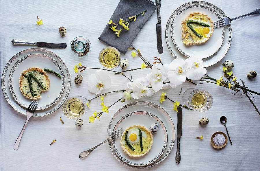 Asparagus Quiche With Fried Quail Egg On A Dining Table Set For Easter #1 Photograph by Laura Negrato