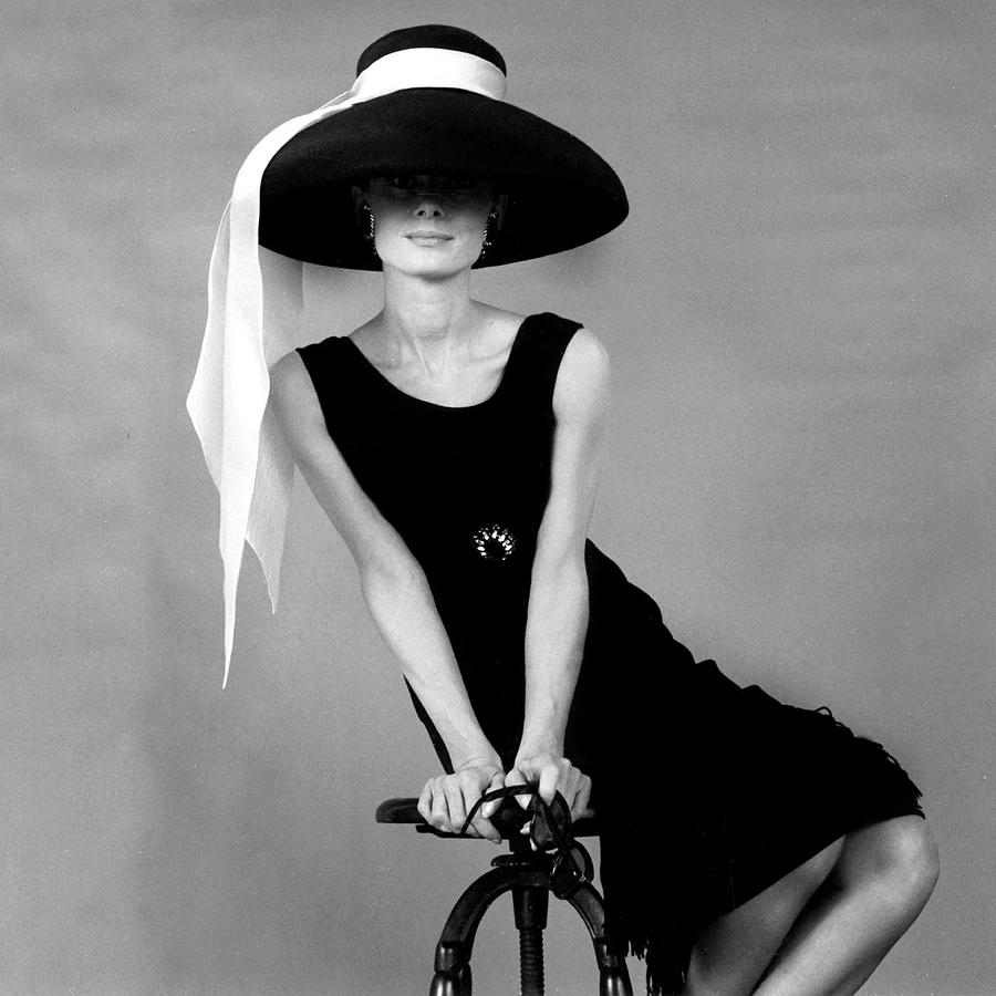Audrey Hepburn Photograph - Audrey Hepburn In Hat For Breakfast At Tiffanys #1 by Globe Photos