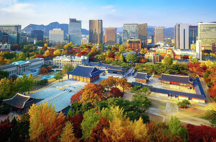 Autumn park and temple in old palace in Seoul city #1 Photograph by Anek Suwannaphoom