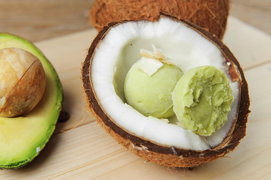 Avocado And Coconut Ice Cream Served In A Coconut Half #1 Photograph by Jalag / Intosite Kitchengirls