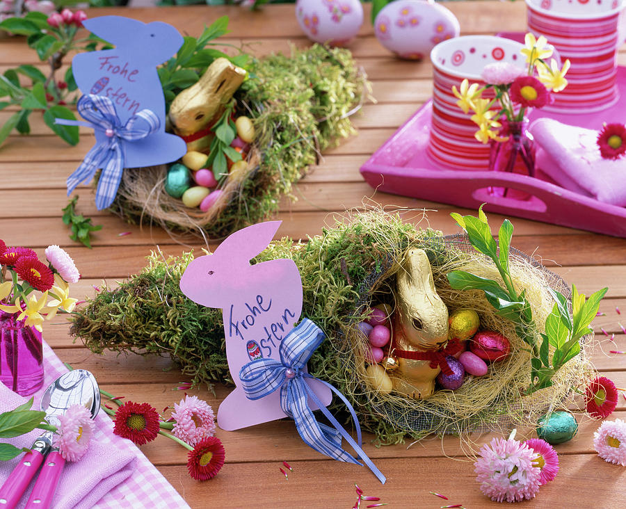 Bag Of Moss With Chocolate Bunny And Chocolate Eggs #1 Photograph by Friedrich Strauss
