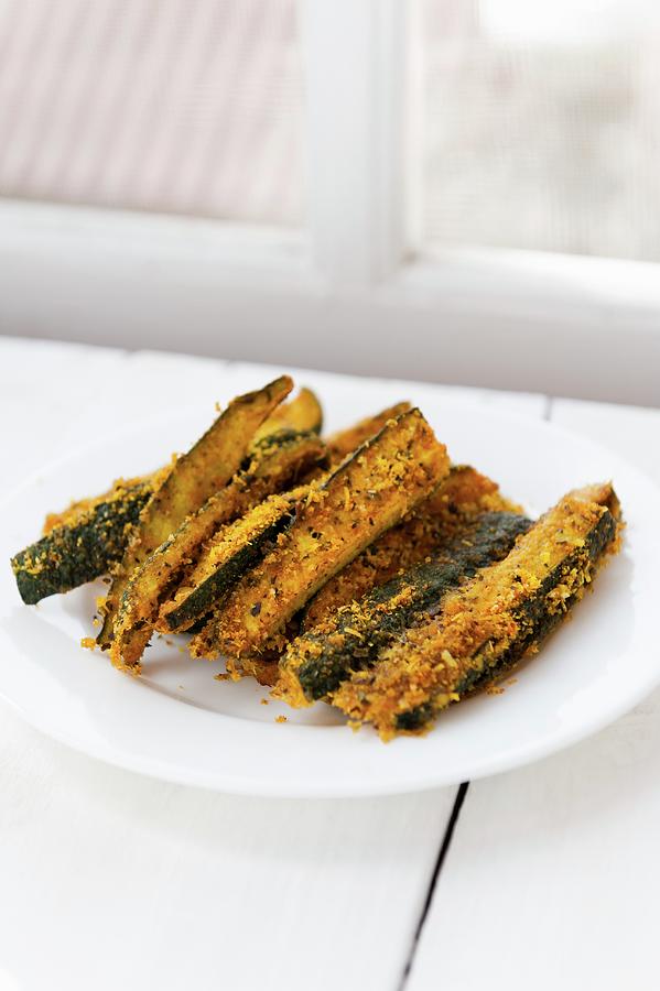 Baked Courgette Strips With A Parmesan Crust #1 Photograph by Gabriela Lupu
