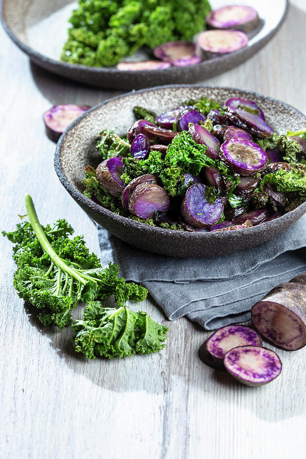 Baked Purple Potatoes With Kale #1 Photograph by Larisa Blinova