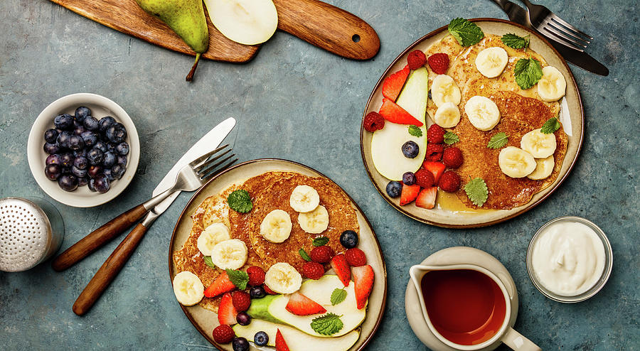 Banana Oat Pancakes With Fruits, Berries And Maple Syrup #1 Photograph by Natalia Klenova