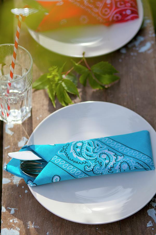 Bandanas Used As Napkins On Rustic Wooden Table In Garden #1 Photograph by Studio Lipov