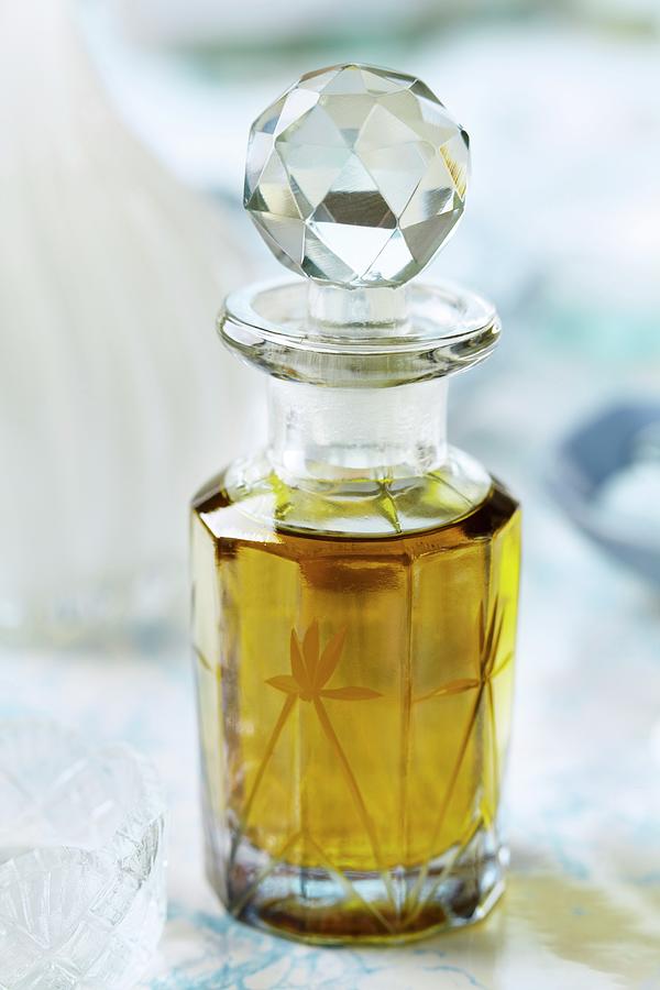 Bath Oil In A Crystal Glass Bottle #1 Photograph by Franziska Taube