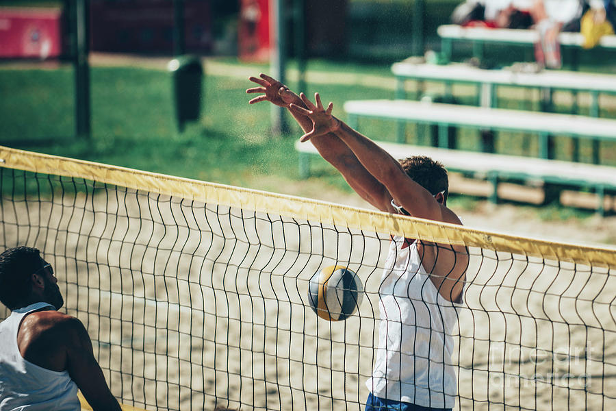 Beach Volleyball Players At The Net #1 Photograph by Microgen Images/science Photo Library