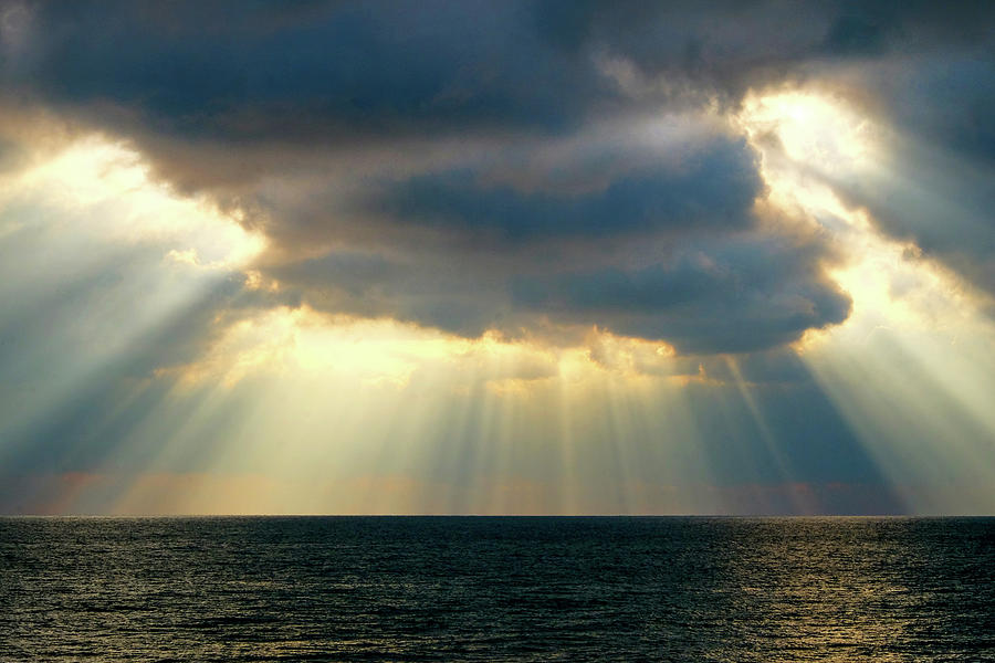 rays of sunlight through clouds