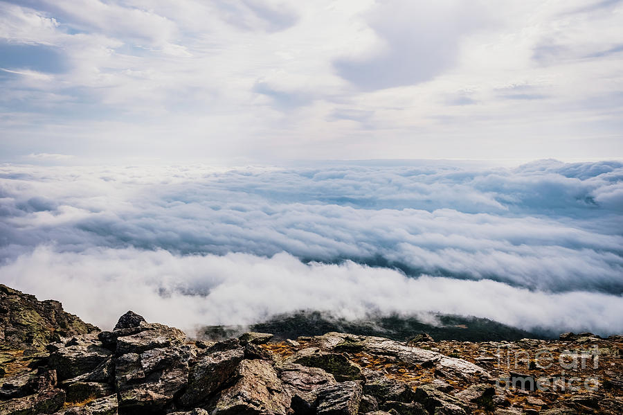 Beautiful view from the top of a mountain of a sea of clouds. #2 Photograph by Joaquin Corbalan